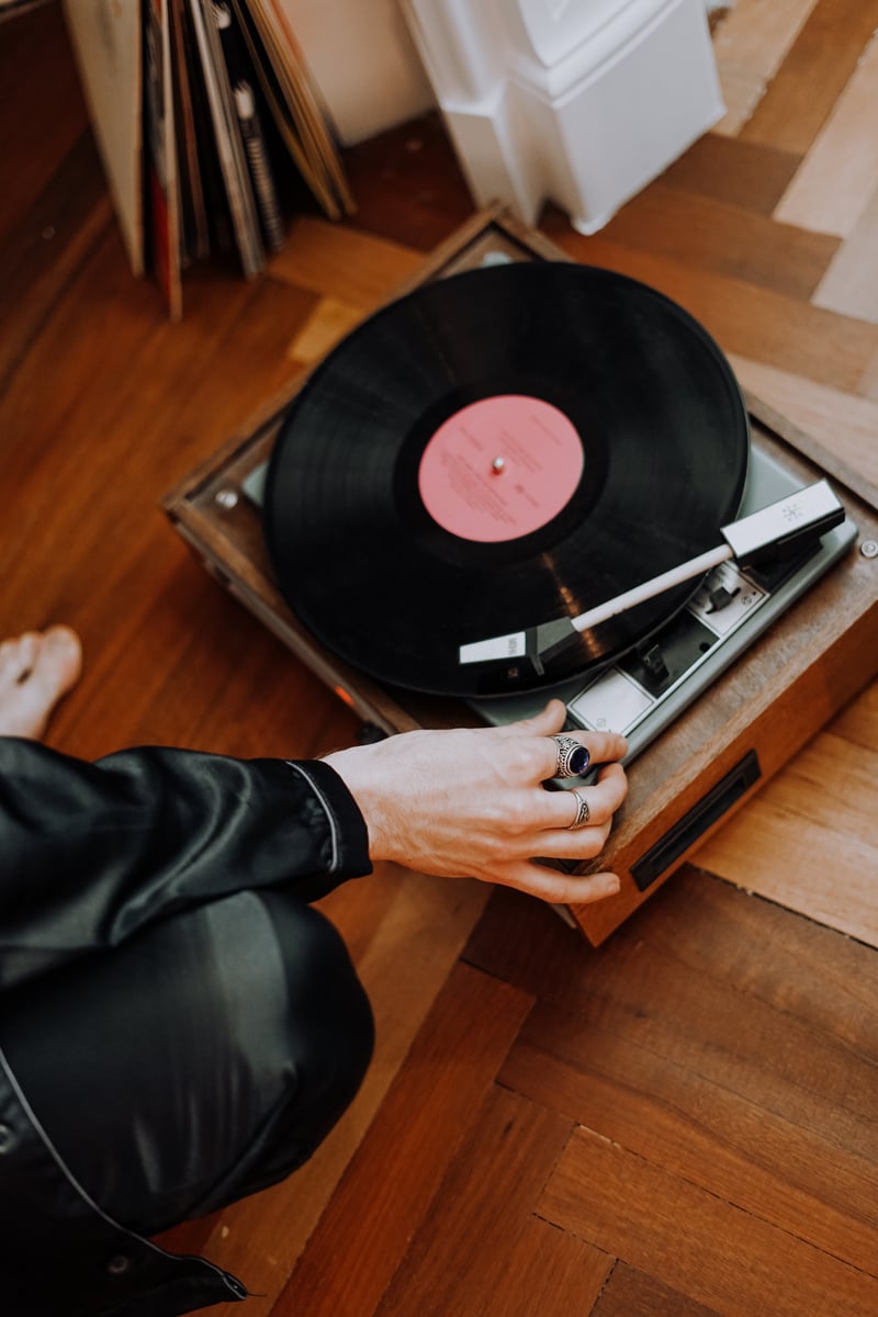 Person Holding Antique Turntable